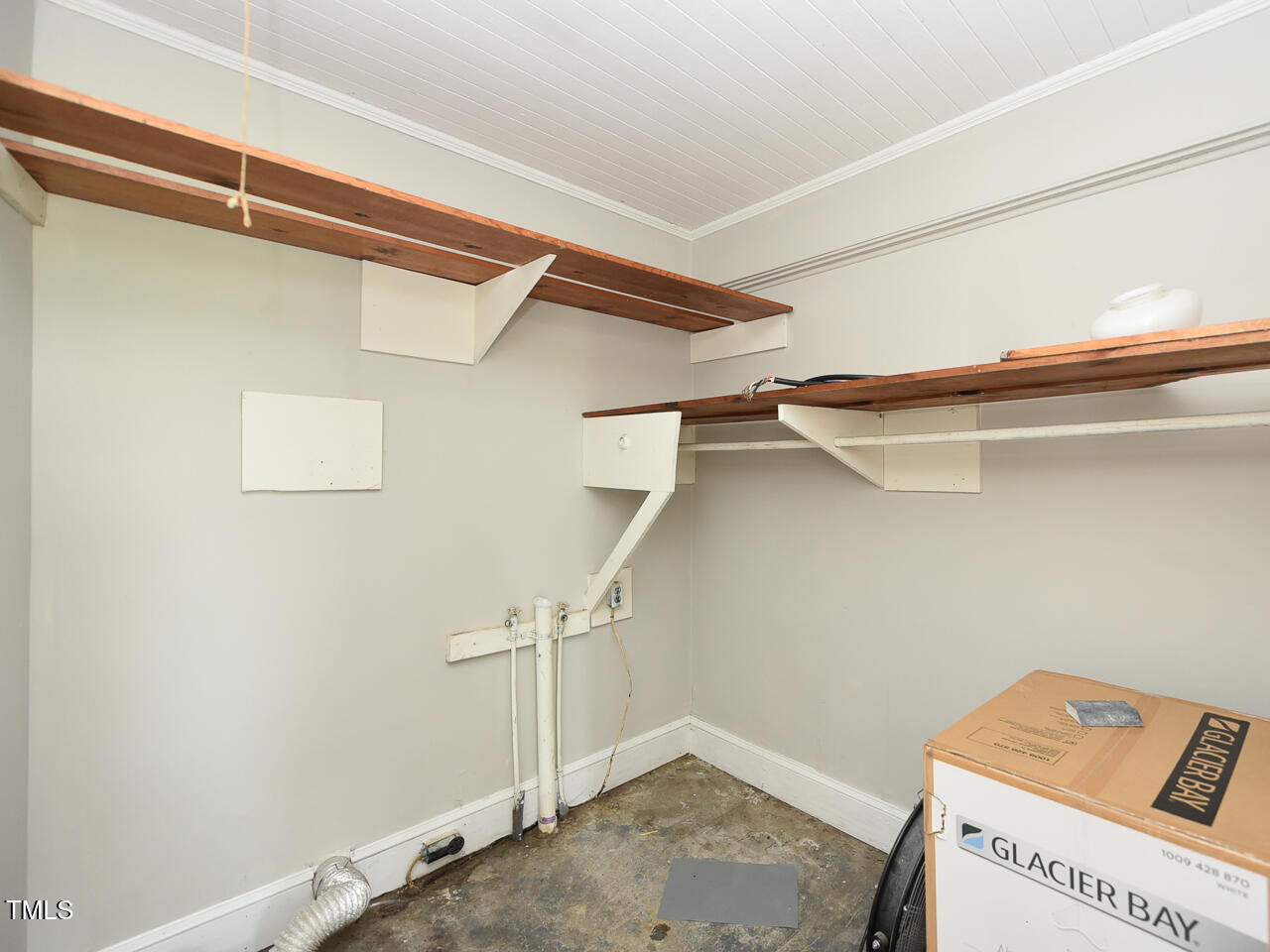 232 Mitchell Farm Road Goldsboro, NC 27530 - Photo 69 of 82 a view of a room with racks on the wall