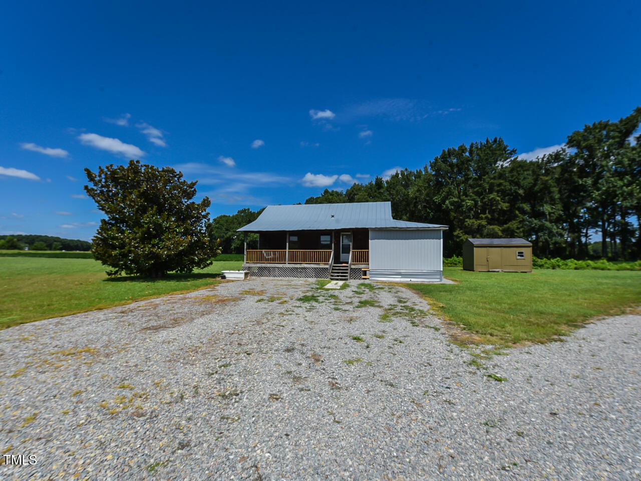 232 Mitchell Farm Road Goldsboro, NC 27530 - Photo 76 of 82 a front view of a house with a yard