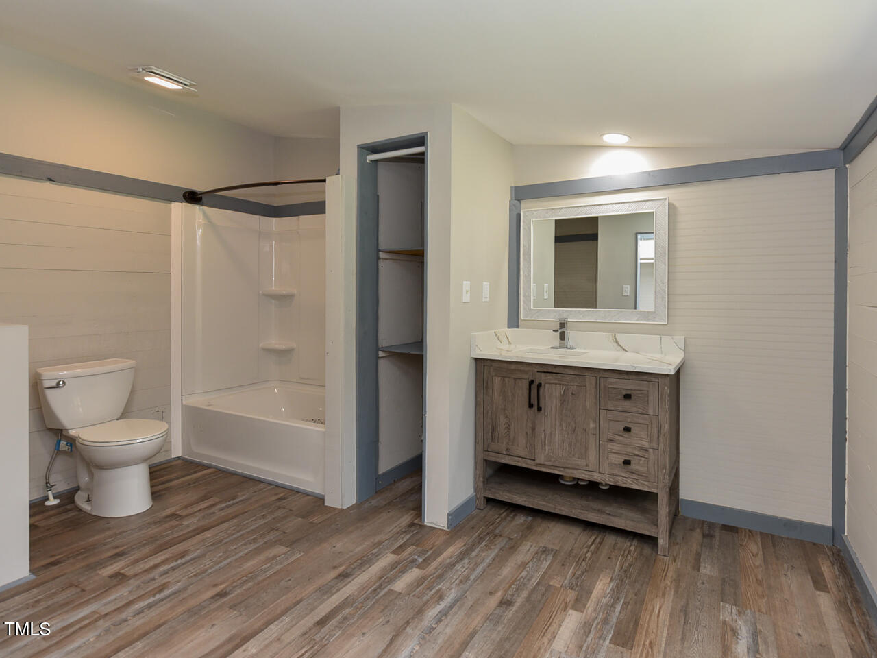 232 Mitchell Farm Road Goldsboro, NC 27530 - Photo 10 of 82 a bathroom with a toilet sink and mirror