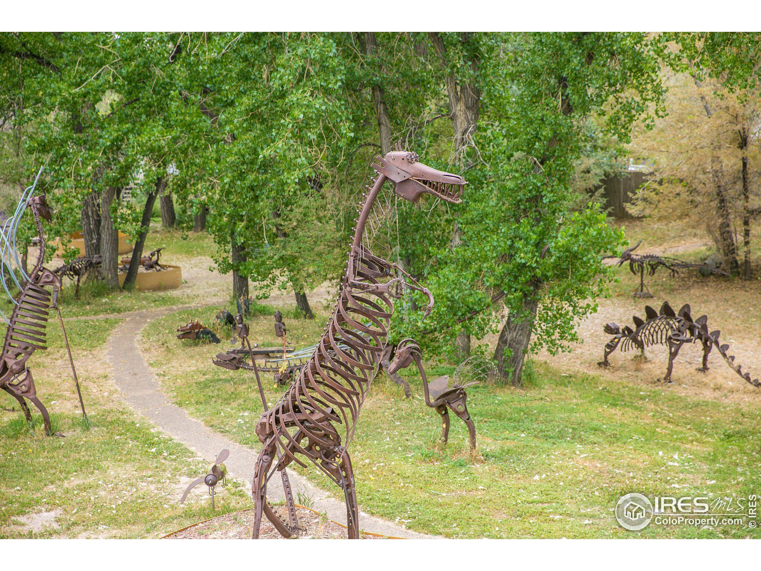 4801 East Harmony Road Fort Collins, CO 80528 - Photo 12 of 27 a view of swimming pool with a yard
