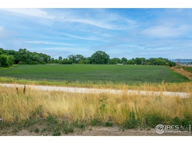 a view of a lake with a big yard