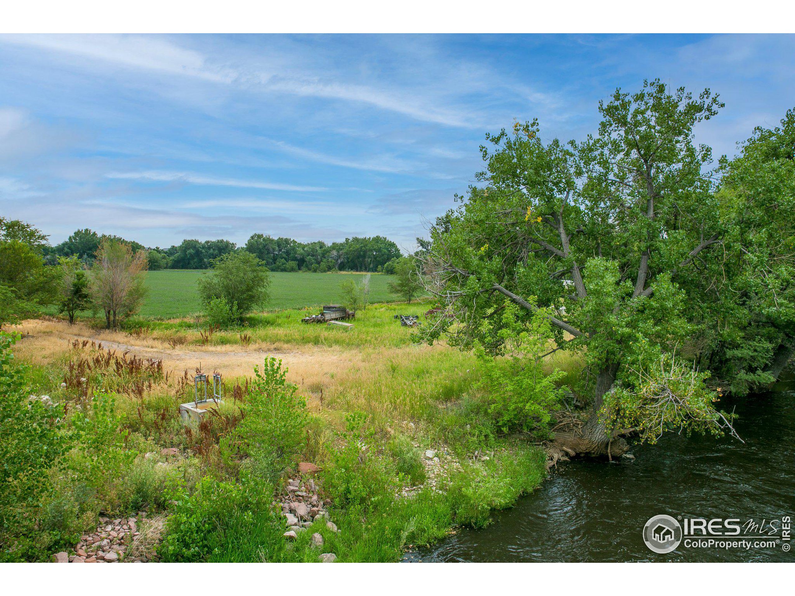 4801 East Harmony Road Fort Collins, CO 80528 - Photo 14 of 27 a view of a lush green field