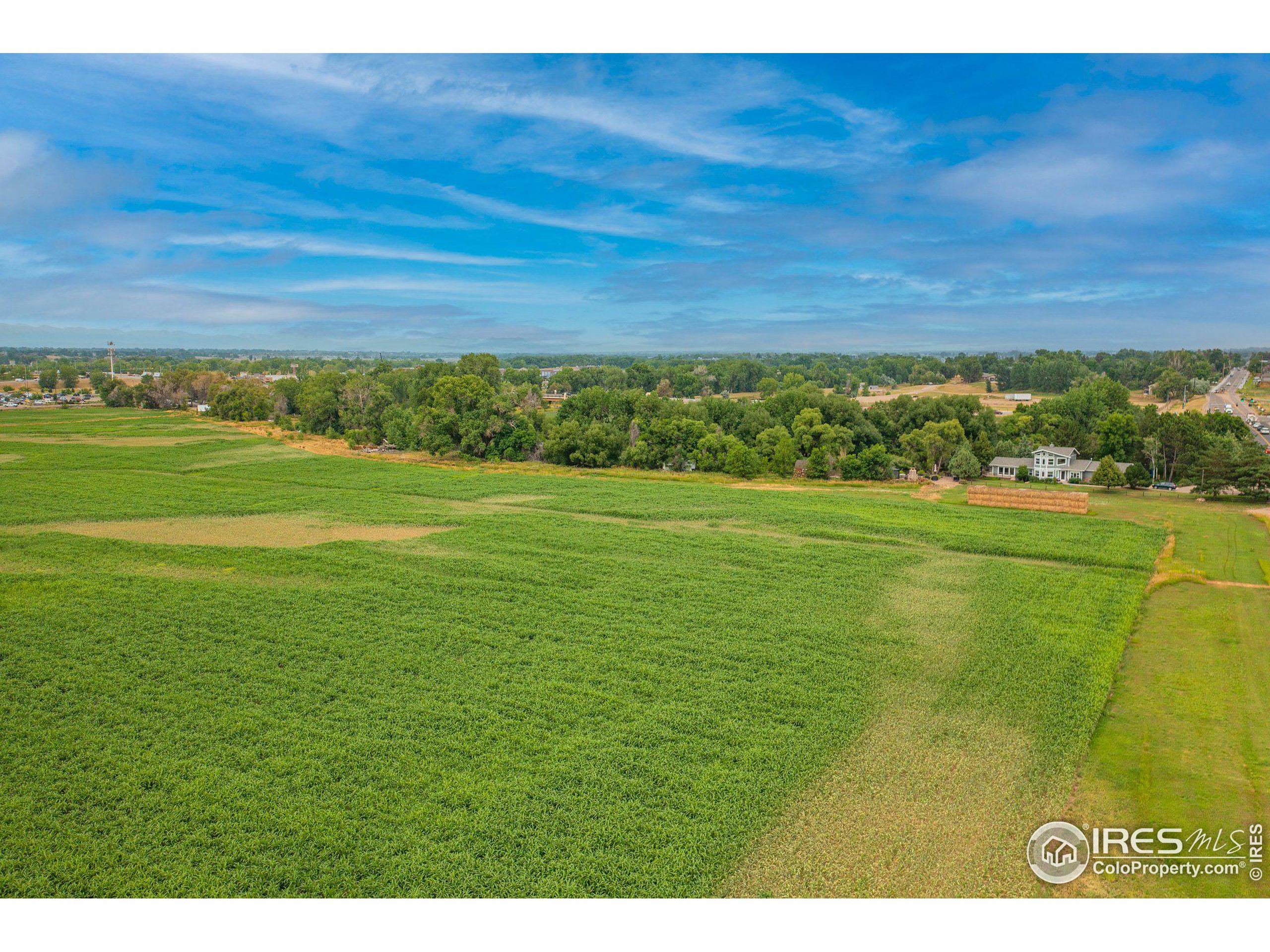 4801 East Harmony Road Fort Collins, CO 80528 - Photo 19 of 27 a view of a big yard with a mountain