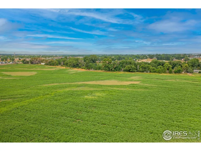 a view of a big yard with an outdoor space