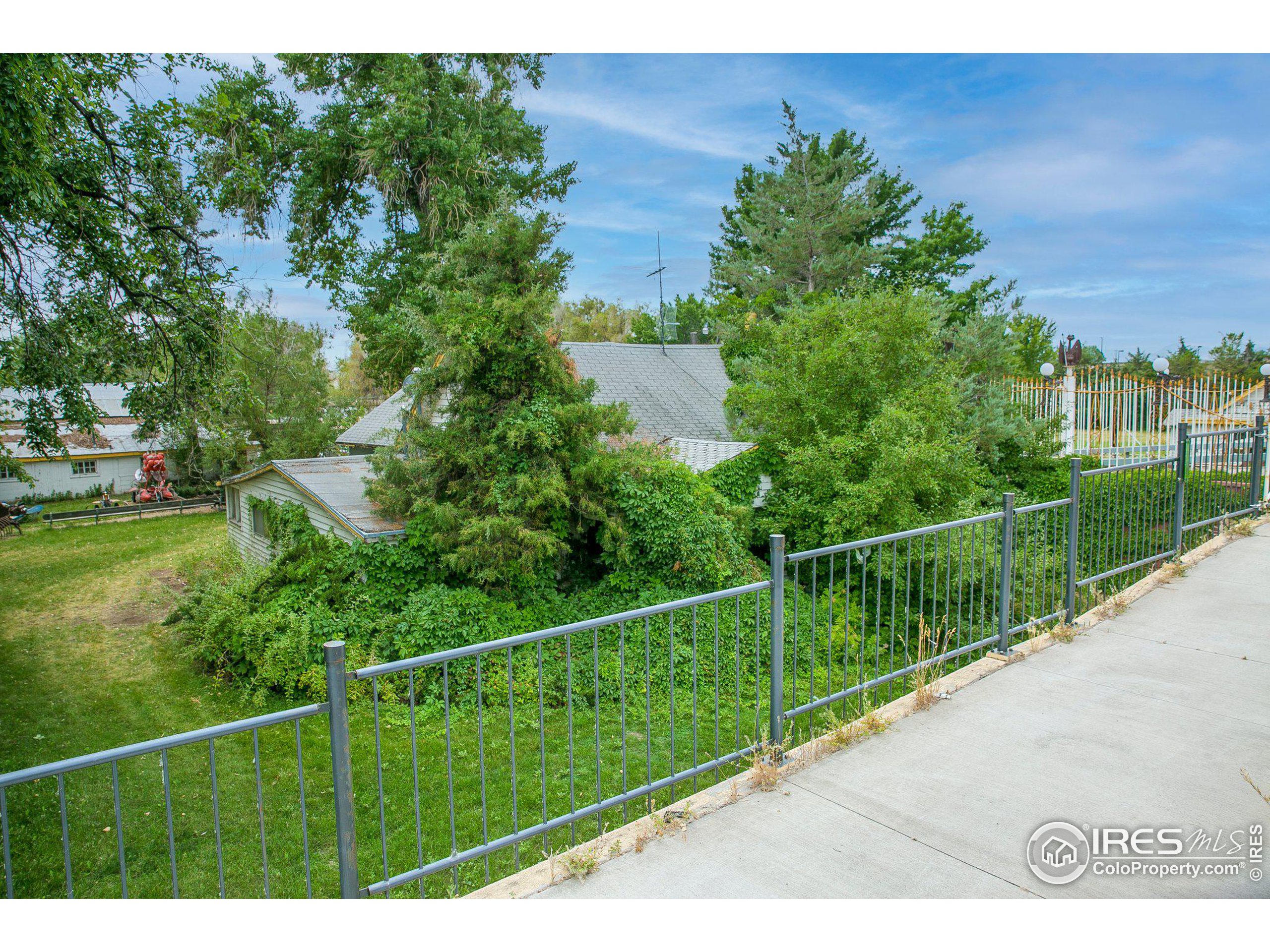 4801 East Harmony Road Fort Collins, CO 80528 - Photo 9 of 27 a view of a fence and a park