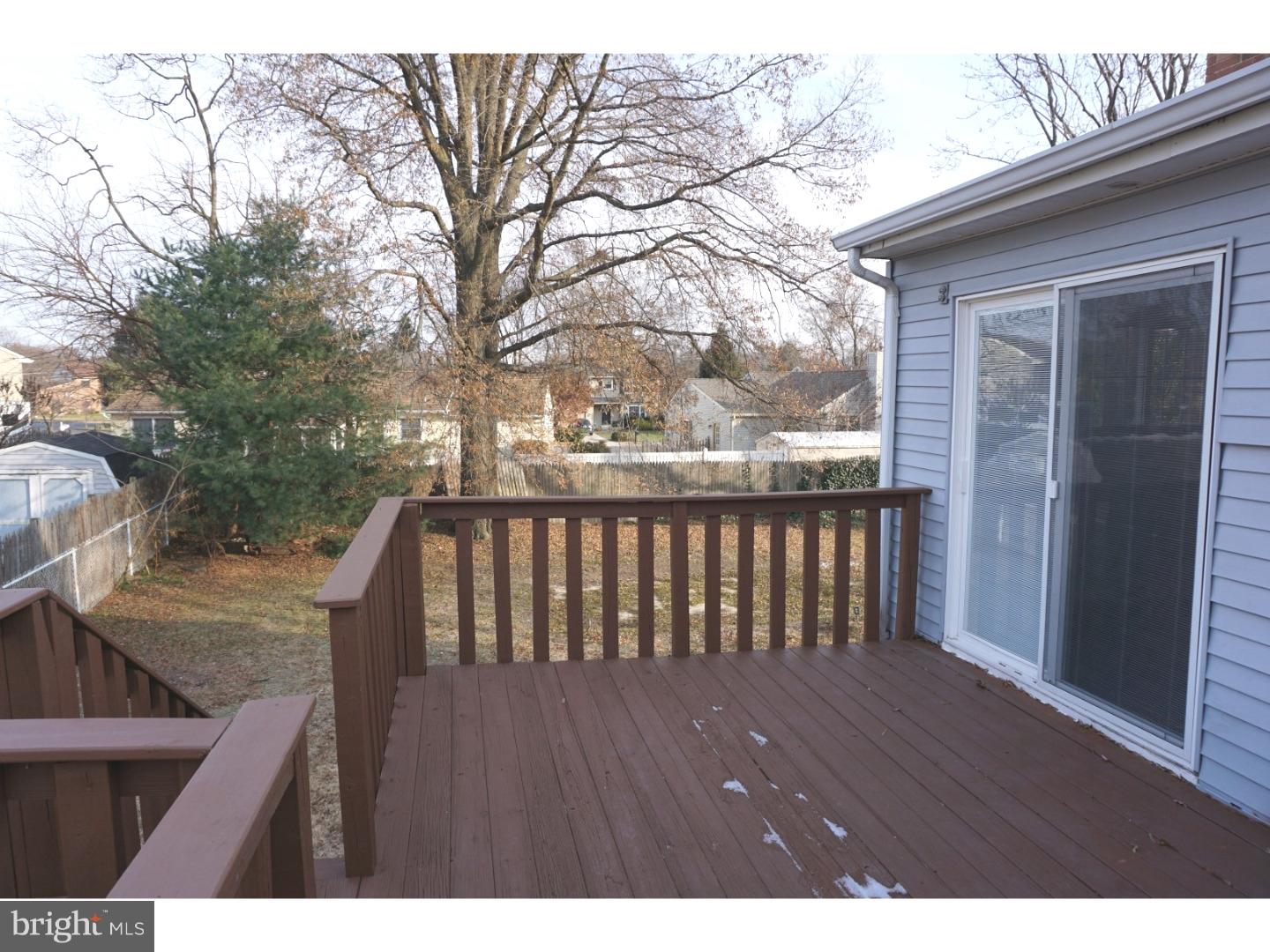 772 Lancing Road Deptford, NJ 08096 - Photo 22 of 24 a view of backyard with wooden deck and large trees