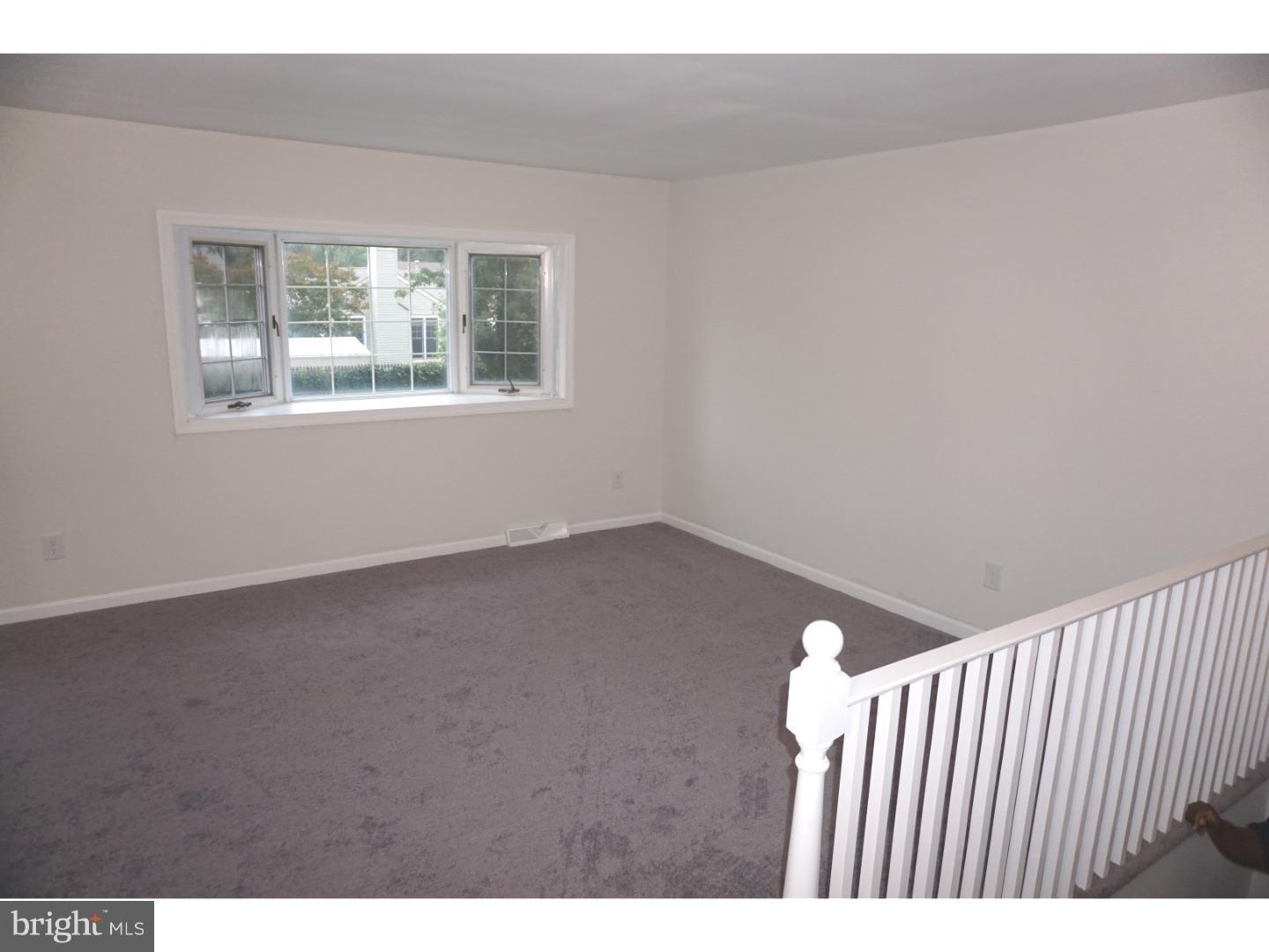 772 Lancing Road Deptford, NJ 08096 - Photo 5 of 24 a view of an empty room with a window
