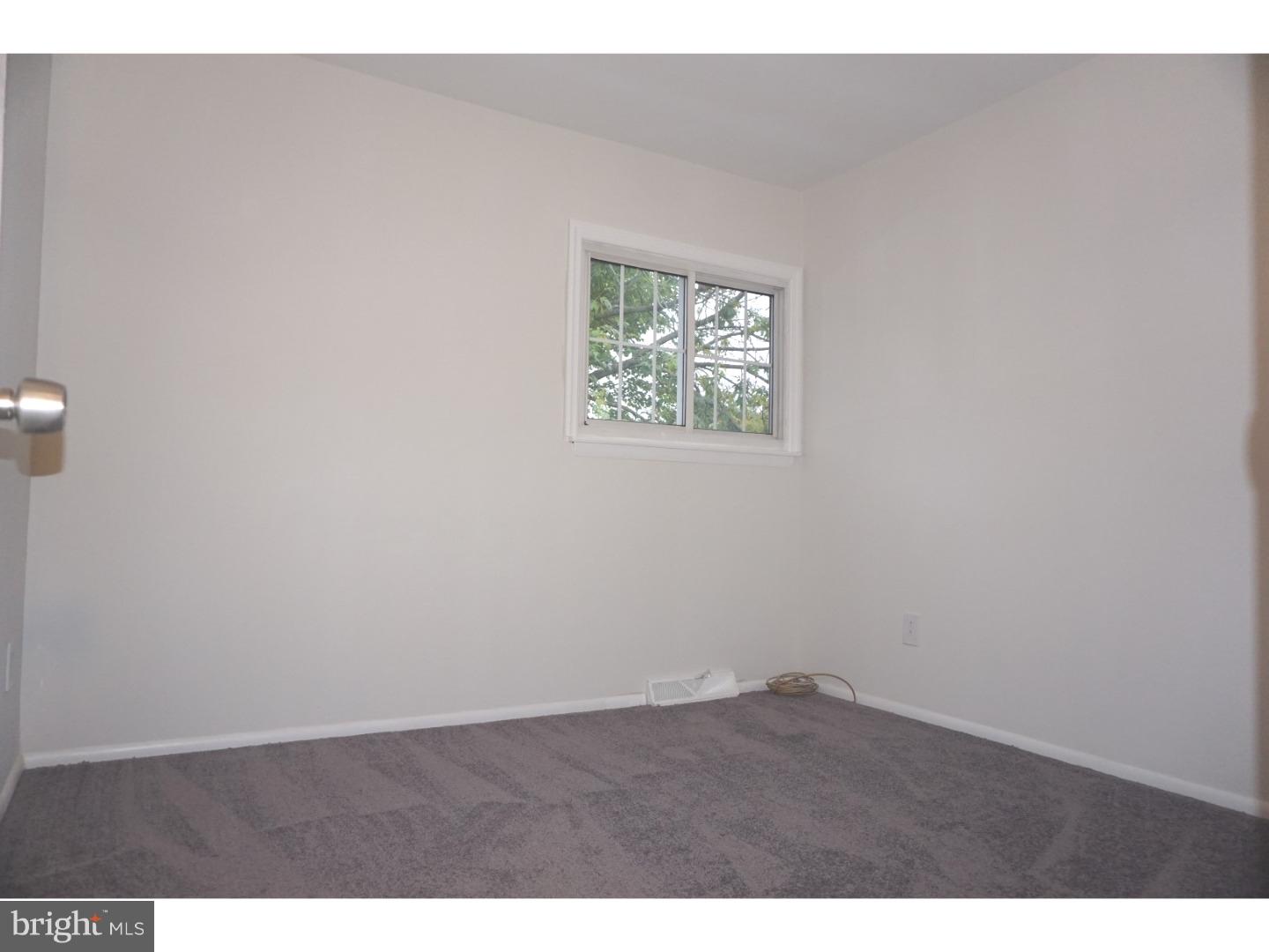 772 Lancing Road Deptford, NJ 08096 - Photo 9 of 24 a view of an empty room with a window