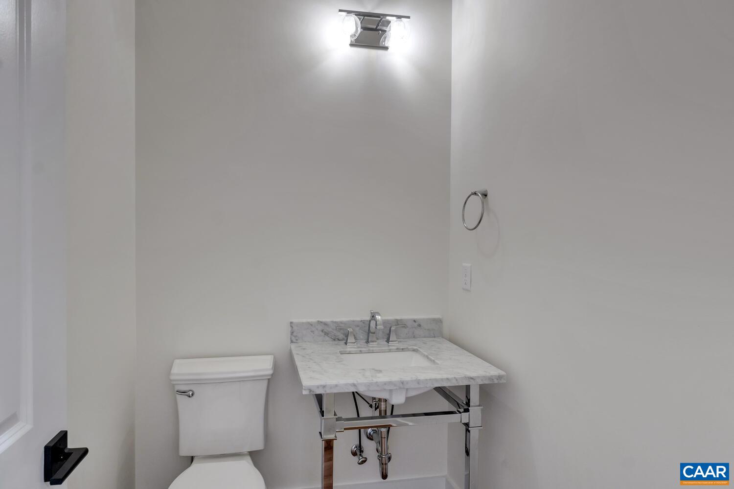 3 B Jarmans Gap Road, Unit LOT 3B JARMANS GAP Crozet, VA 22932 - Photo 22 of 39 a bathroom with a sink toilet and a mirror