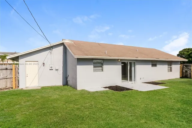 a house view with a garden space