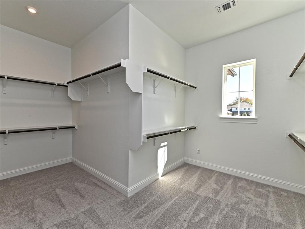 270 Prairie Clover Drive Dripping Springs, TX 78620 - Photo 19 of 28 Walk in closet with light carpet