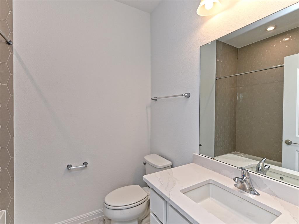 270 Prairie Clover Drive Dripping Springs, TX 78620 - Photo 25 of 28 Bathroom with vanity and a tile shower