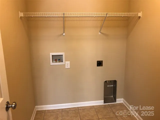 an empty room with a empty space and a window