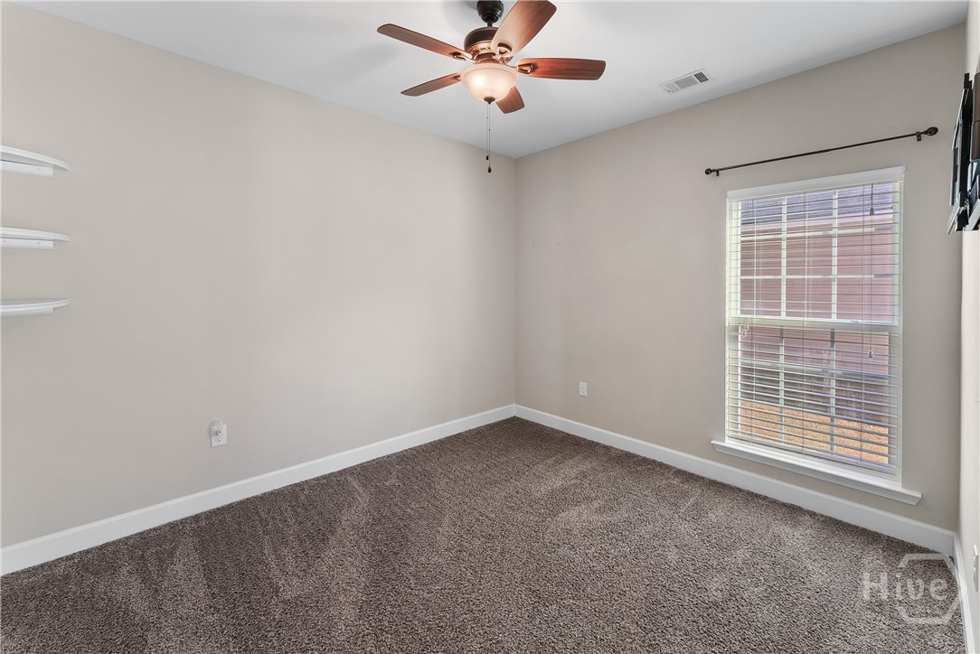 118 Red Maple Lane Guyton, GA 31312 - Photo 8 of 44 1st floor bedroom 2