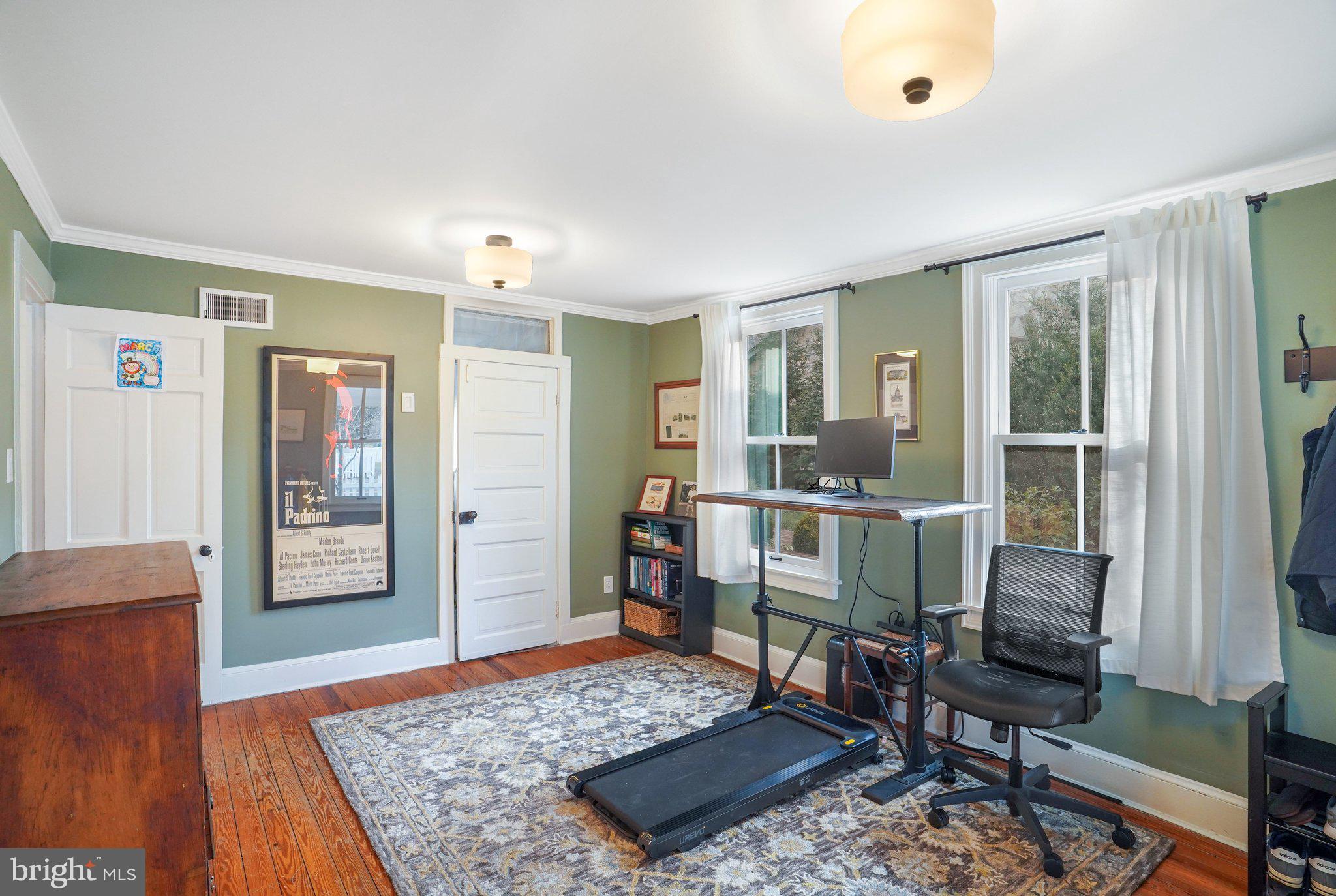 7153 Main Street Clifton, VA 20124 - Photo 41 of 77 a living room with furniture and a rug