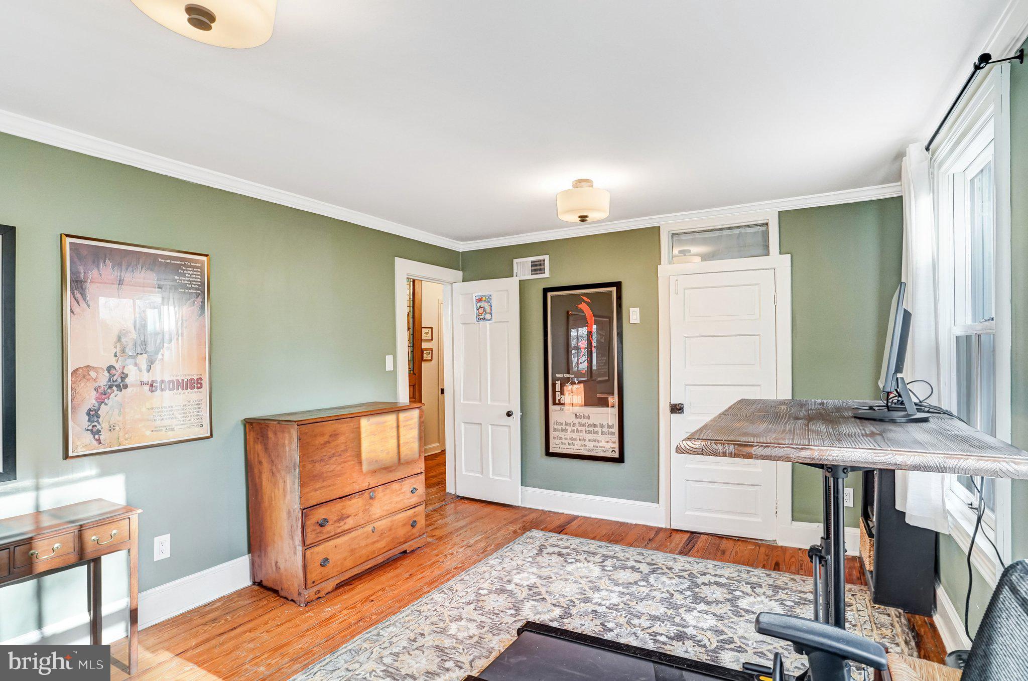 7153 Main Street Clifton, VA 20124 - Photo 42 of 77 a view of a workspace with furniture and a window