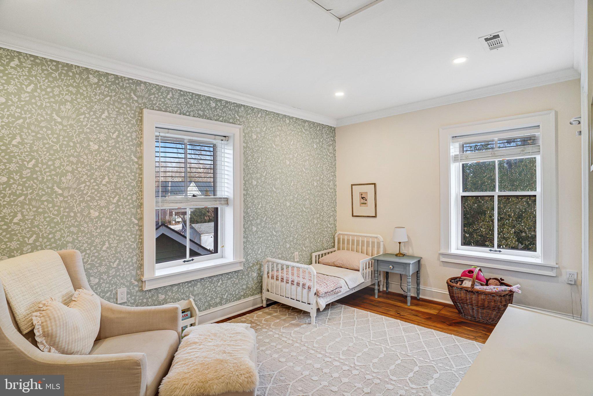 7153 Main Street Clifton, VA 20124 - Photo 55 of 77 a bedroom with furniture and a window