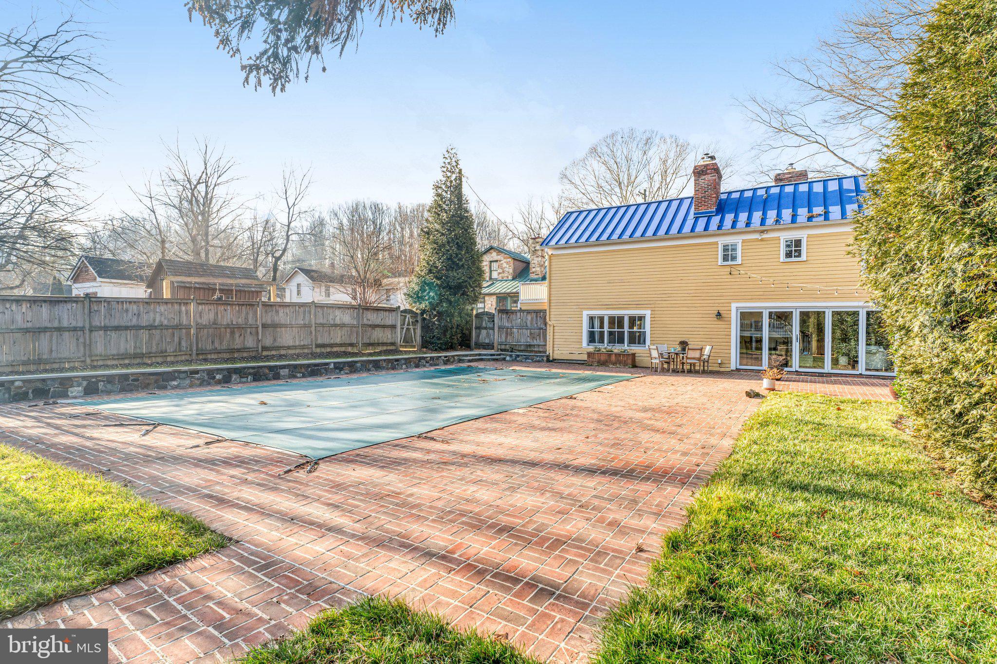 7153 Main Street Clifton, VA 20124 - Photo 69 of 77 a view of a house with a swimming pool