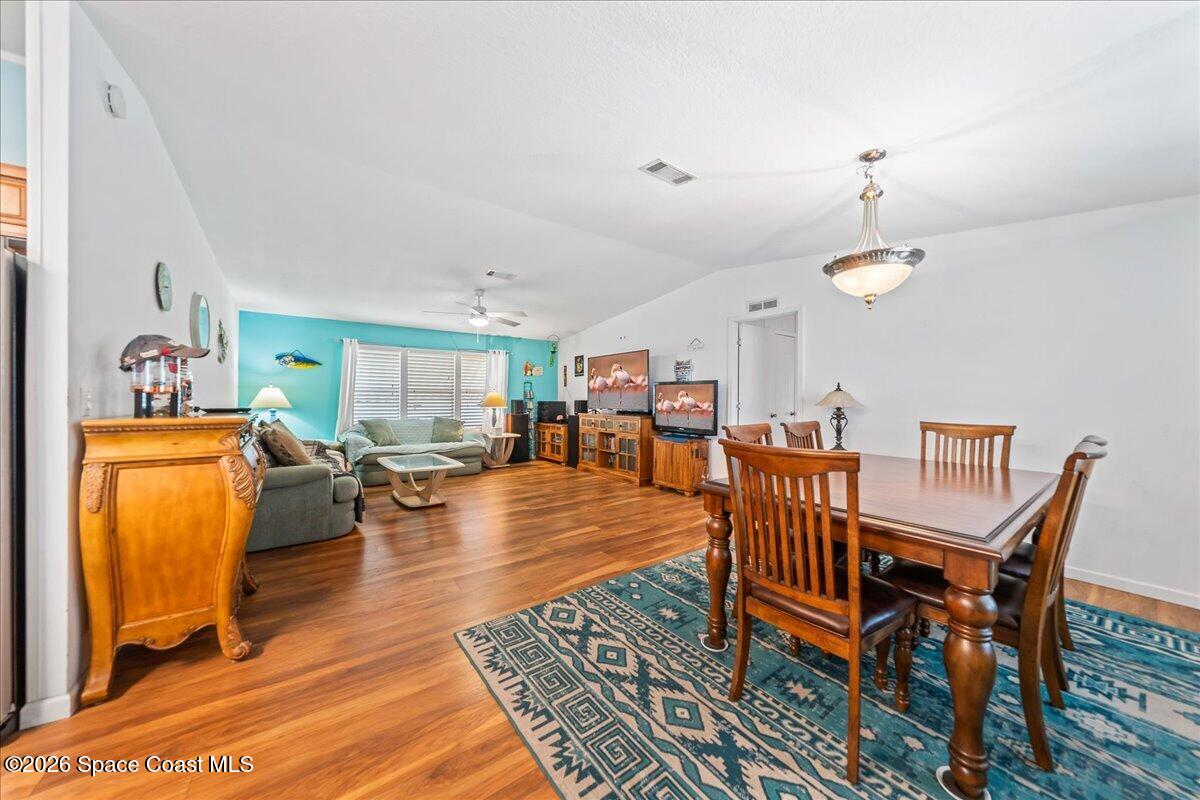7628 Boxelder Road Micco, FL 32976 - Photo 10 of 30 Dining & Living Area