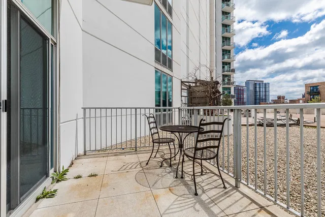 a view of a chairs and table on the terrace