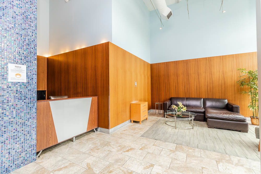 1600 South Indiana Avenue, Unit 501 Chicago, IL 60616 - Photo 3 of 29 a living room with a couch and a window