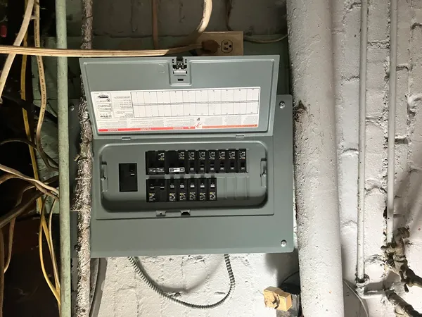 a stove top oven sitting inside of a kitchen