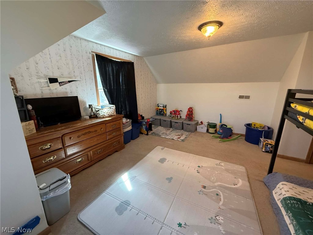 7170 Old Town Road Mount Perry, OH 43760 - Photo 21 of 41 Bedroom featuring wallpapered walls and light carpet
