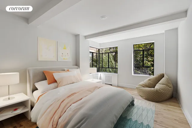 a bedroom with bed and a large window