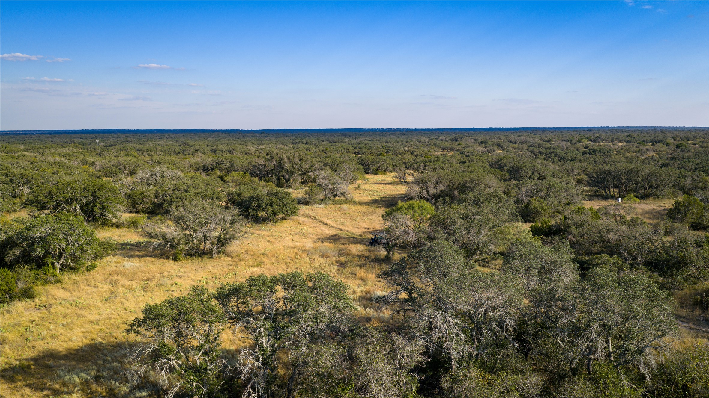 8500 Buck Ridge Drive Brady, TX 76825 - Photo 27 of 32 Aerial view of a heavily wooded area