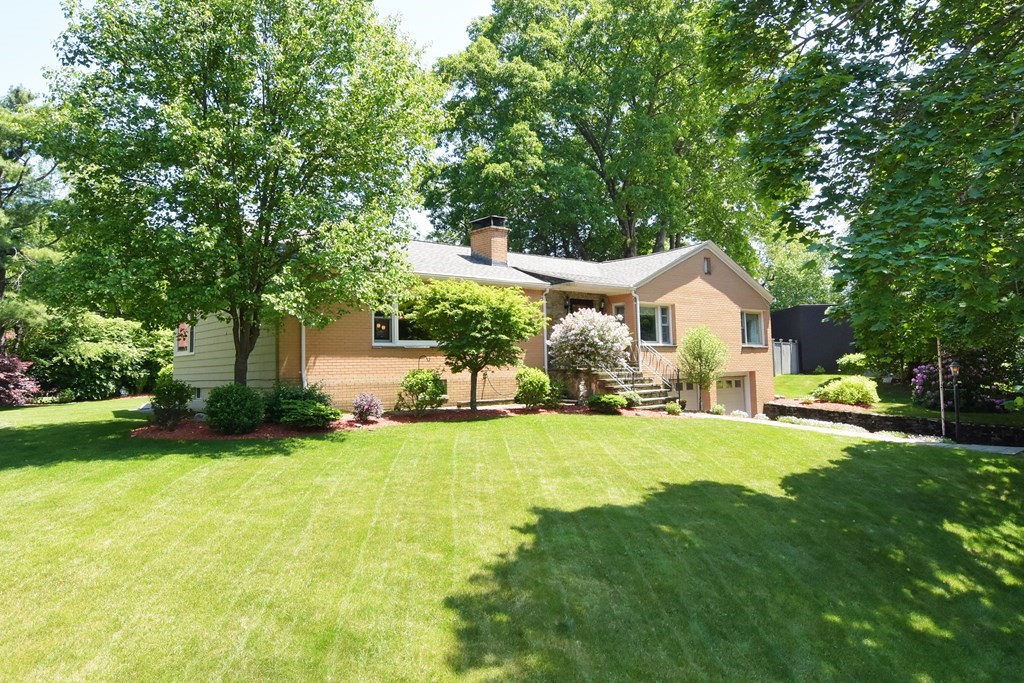 64 Kinnicutt Road Worcester, MA 01602 - Photo 1 of 38 a front view of a house with yard and green space