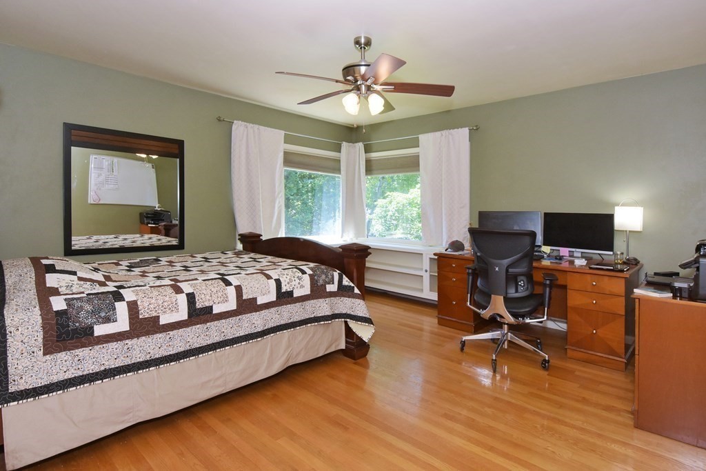 64 Kinnicutt Road Worcester, MA 01602 - Photo 18 of 38 a bedroom with a bed and a desk