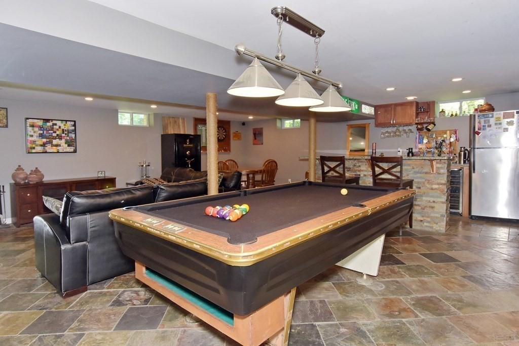 64 Kinnicutt Road Worcester, MA 01602 - Photo 27 of 38 a living room with stainless steel furniture pool table and a window