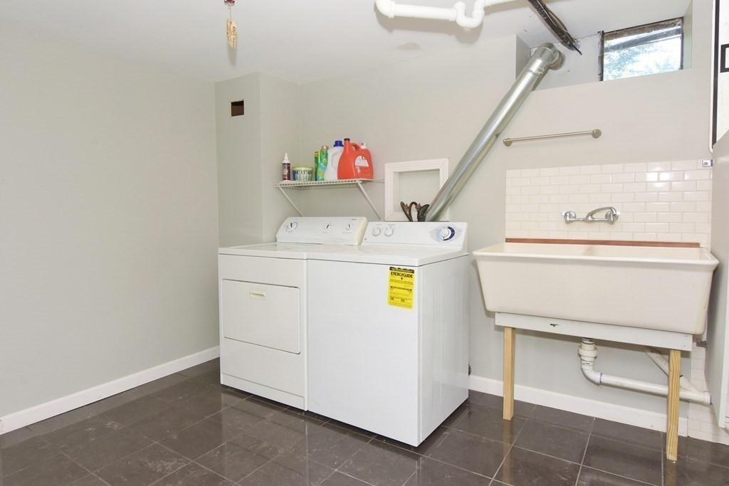 64 Kinnicutt Road Worcester, MA 01602 - Photo 32 of 38 a utility room with dryer and washer
