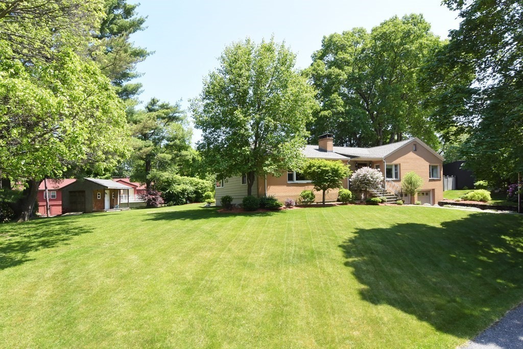 64 Kinnicutt Road Worcester, MA 01602 - Photo 37 of 38 a front view of a house with yard and green space