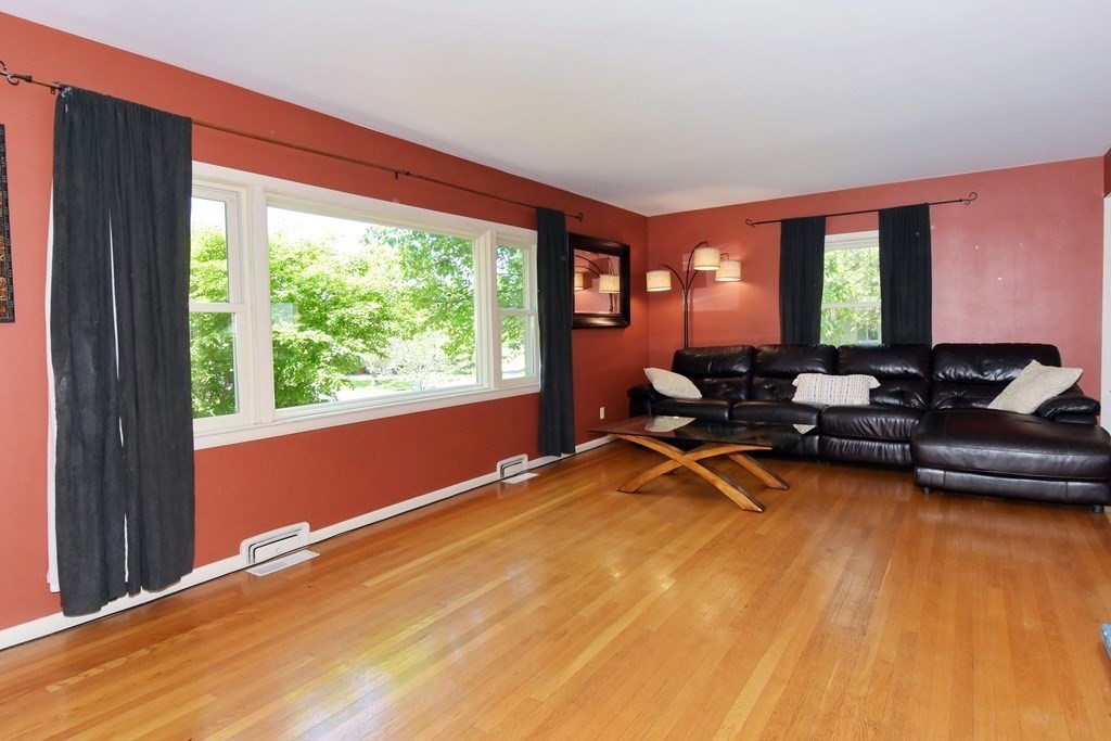 64 Kinnicutt Road Worcester, MA 01602 - Photo 4 of 38 a view of a room with gym equipment and floor to ceiling window