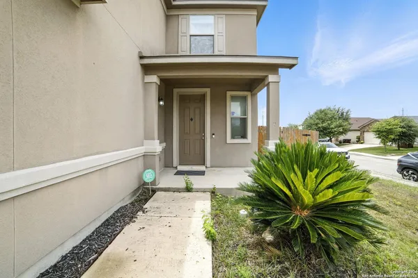 a house view with a outdoor space