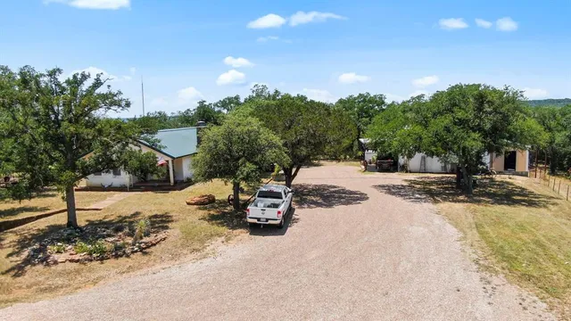 a view of a road with a building in the background
