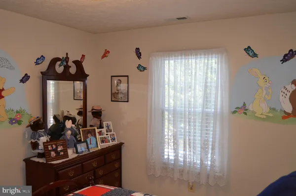 a room with furniture and window