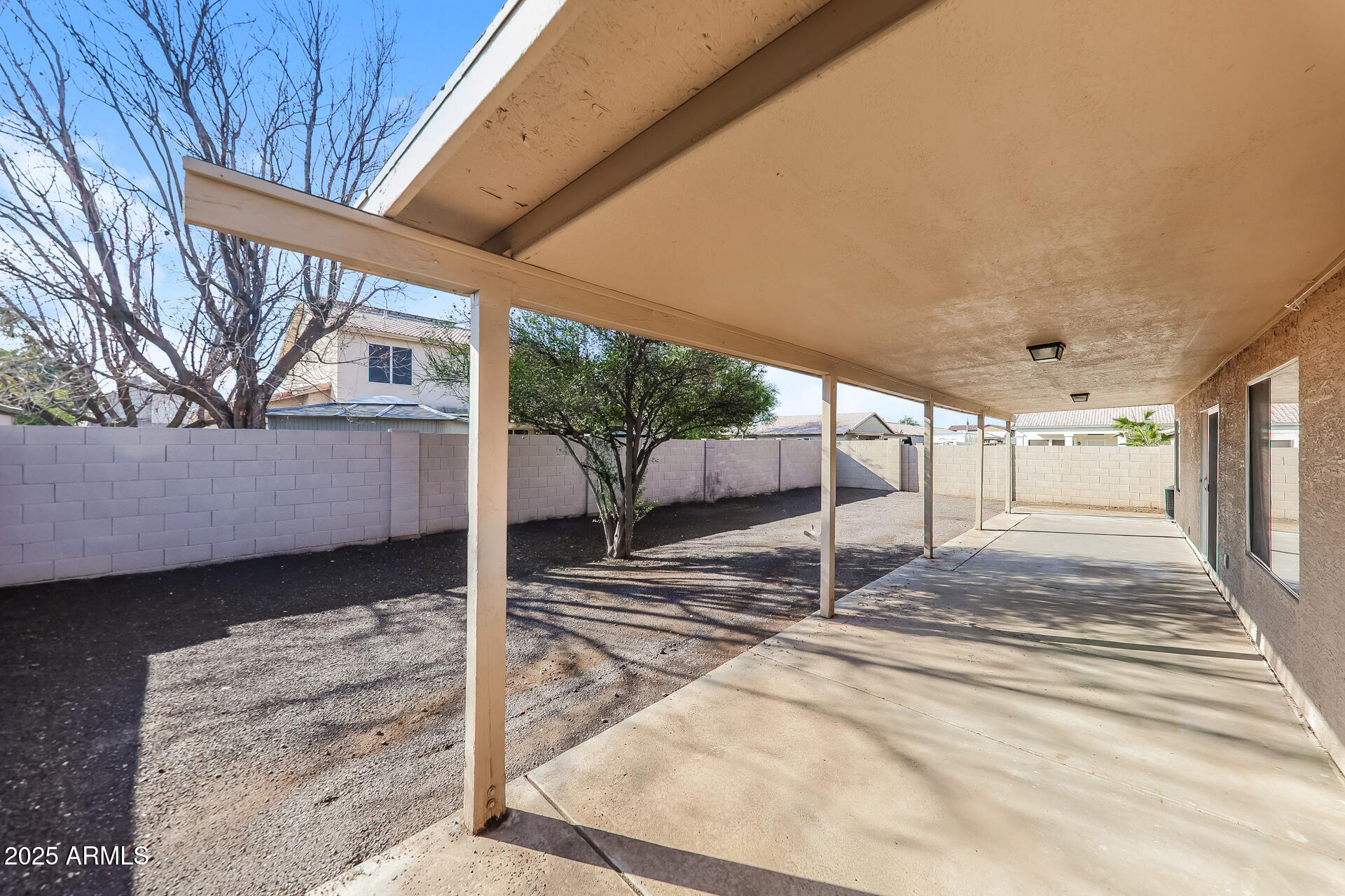8833 West Monte Vista Road Phoenix, AZ 85037 - Photo 20 of 21 a view of a porch