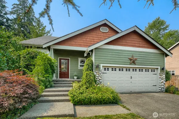 a house with trees in the background