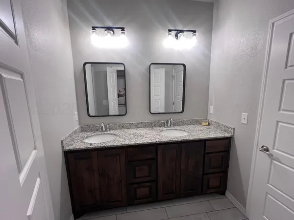 an empty room with mirror