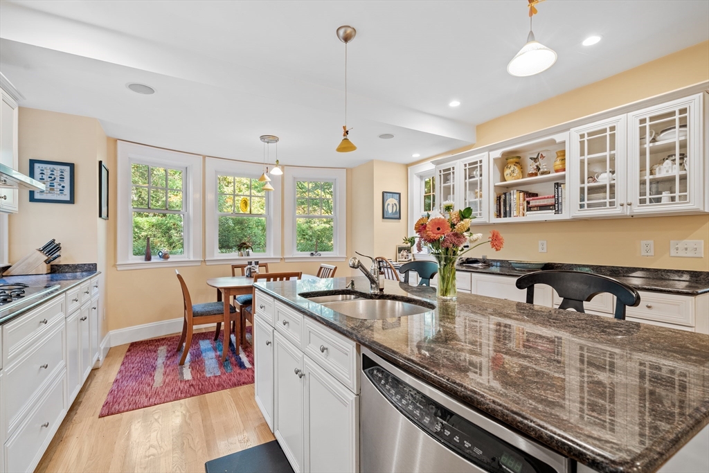 30 Burlington Street Lexington, MA 02420 - Photo 17 of 34 a kitchen with counter space a sink and cabinets