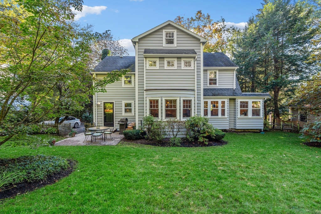 30 Burlington Street Lexington, MA 02420 - Photo 2 of 34 a front view of a house with garden and porch