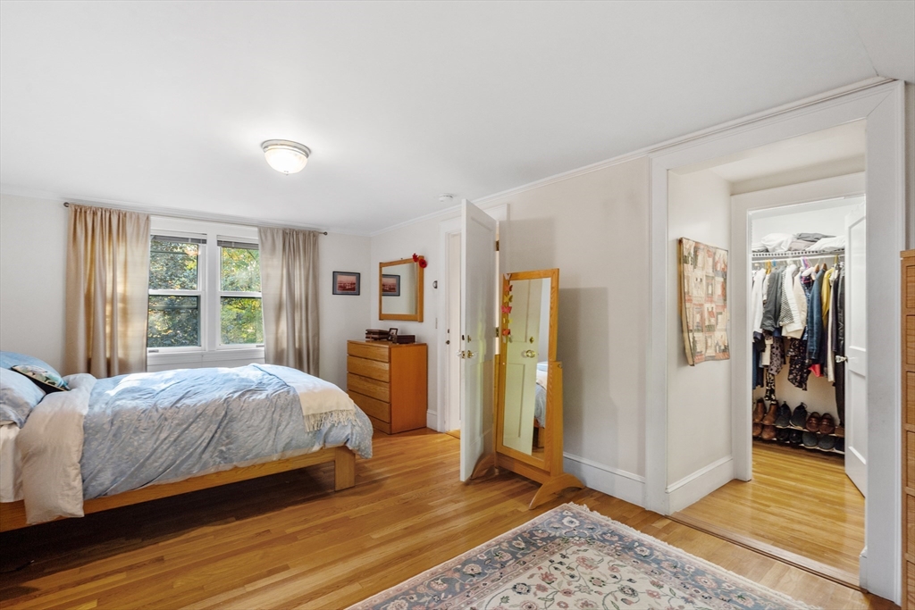30 Burlington Street Lexington, MA 02420 - Photo 21 of 34 a bedroom with a bed and a window
