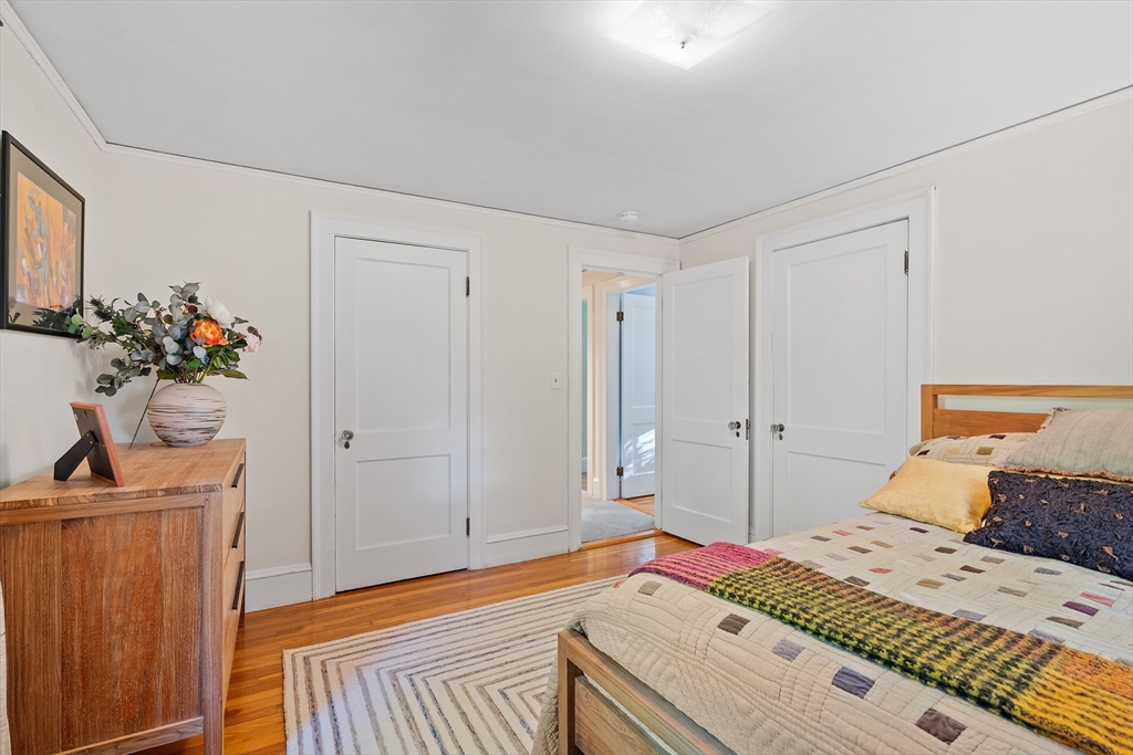 30 Burlington Street Lexington, MA 02420 - Photo 23 of 34 a bedroom with a bed and a dresser