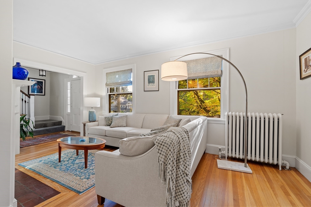 30 Burlington Street Lexington, MA 02420 - Photo 3 of 34 a living room with furniture a window and wooden floor