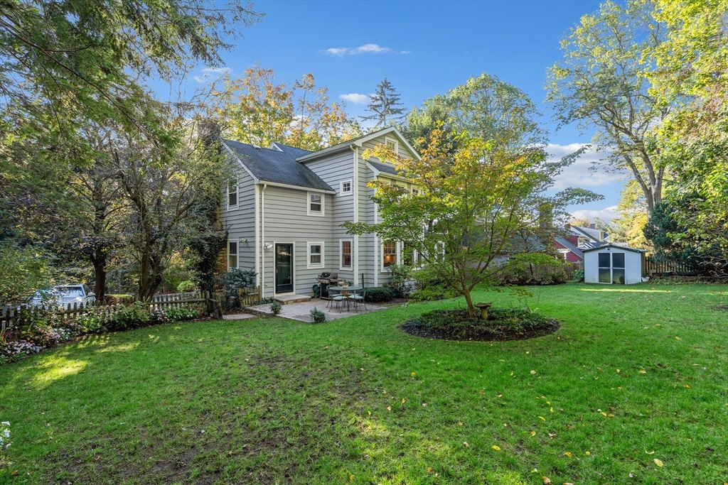 30 Burlington Street Lexington, MA 02420 - Photo 31 of 34 a view of a house with a yard and sitting area