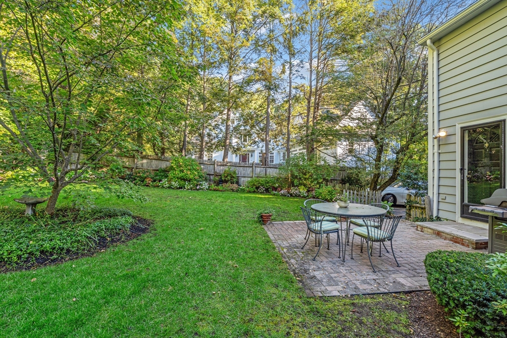 30 Burlington Street Lexington, MA 02420 - Photo 32 of 34 a view of a house with backyard sitting area and garden