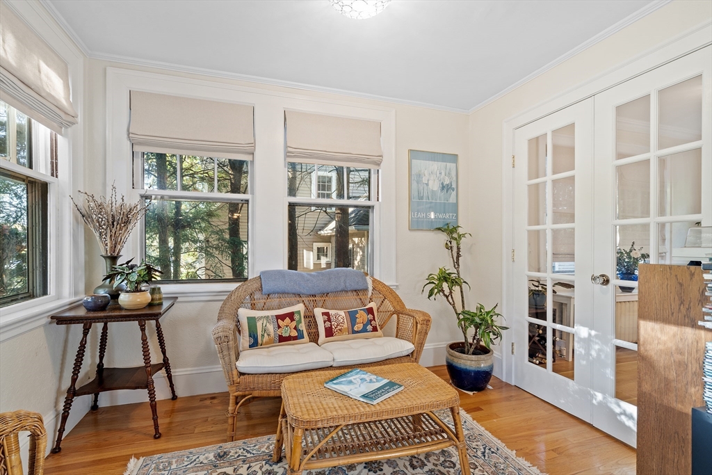 30 Burlington Street Lexington, MA 02420 - Photo 8 of 34 a living room with furniture and a floor to ceiling window