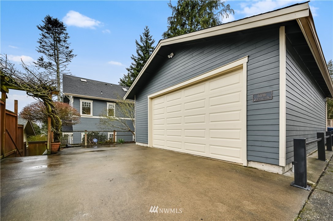 6016 44th Avenue Southwest Seattle, WA 98136 - Photo 31 of 35 a view of a house with a patio
